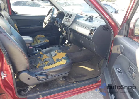 2001 Nissan Frontier Sc-V6 z USA, uszkodzony, nr VIN 1N6MD27T81C385743